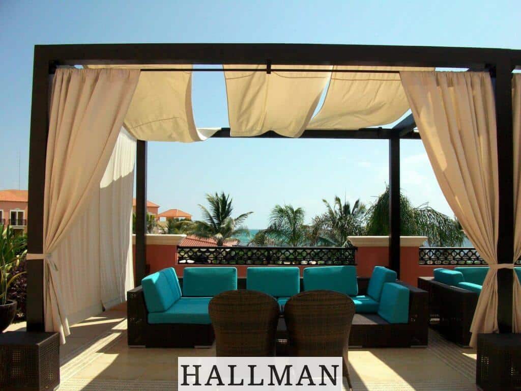Two Brown Wooden Outdoor Chairs